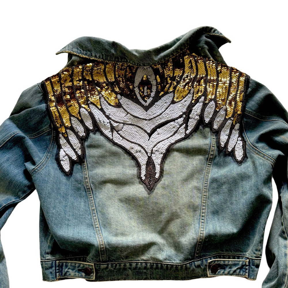 Rock n rolll! Classic Free People ages denim jacket with sequin back. L